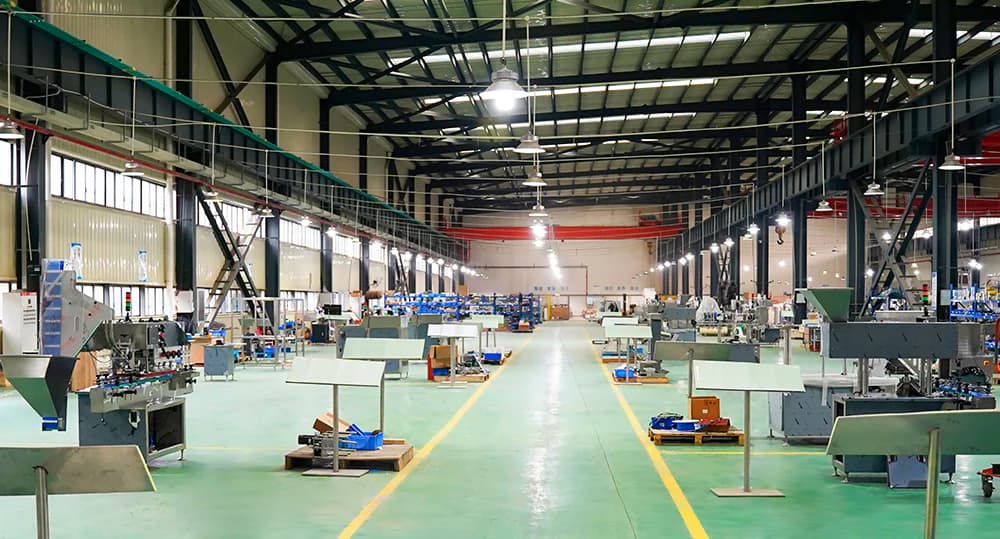 Authorized source-context photograph of an equipment manufacturing workshop